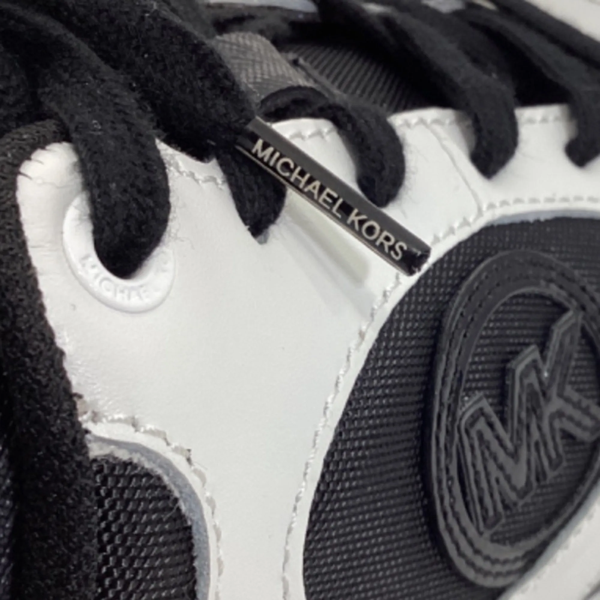 Michael Kors Zuma Empire Signature Logo and Mesh Trainer in Black and White Leather