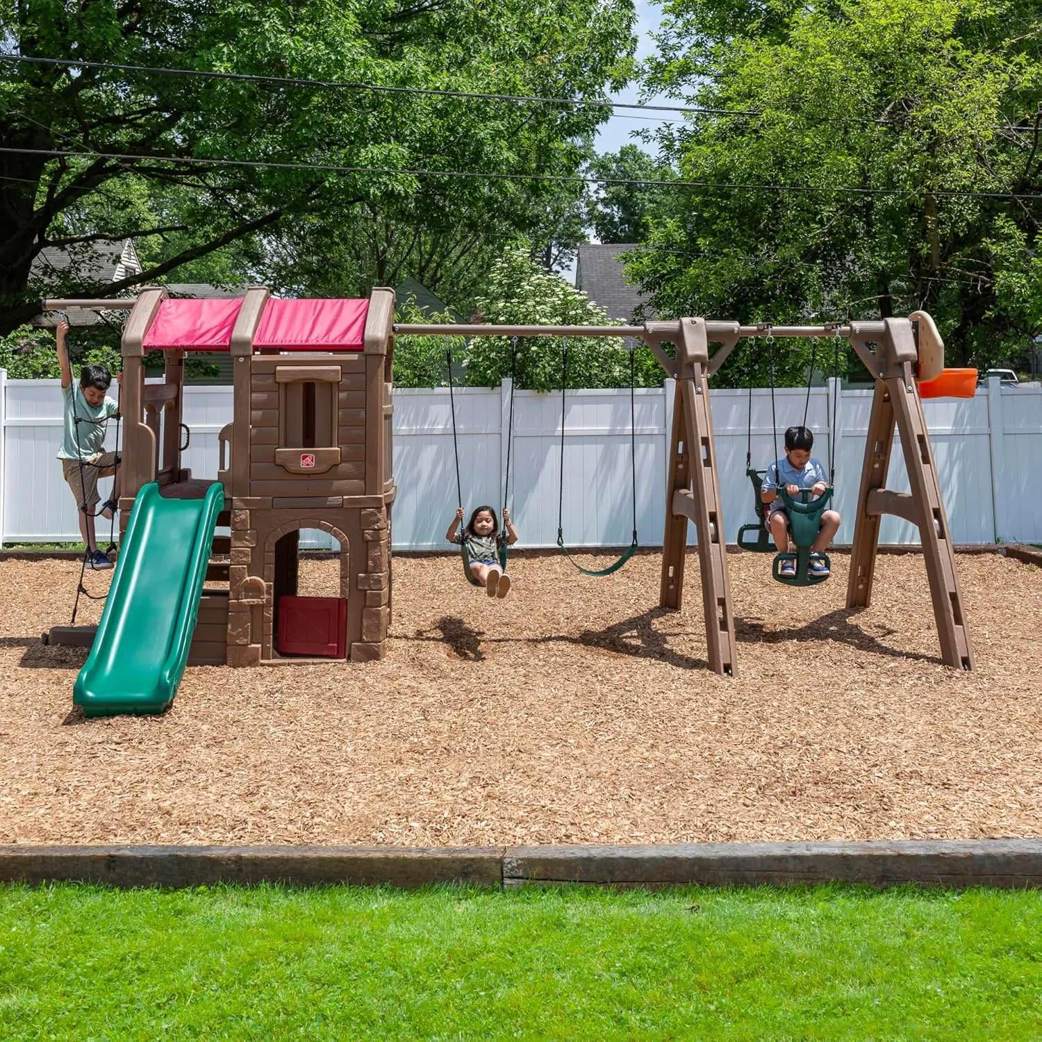 Step2 Naturally Playful Adventure Lodge Play Center with Glider, Kids Outdoor Playset, Two Tier Backyard Playground Set, Slide, Swings, Rope Ladder, Basketball Hoop, Jungle Gym, Children 3-8 Years Old